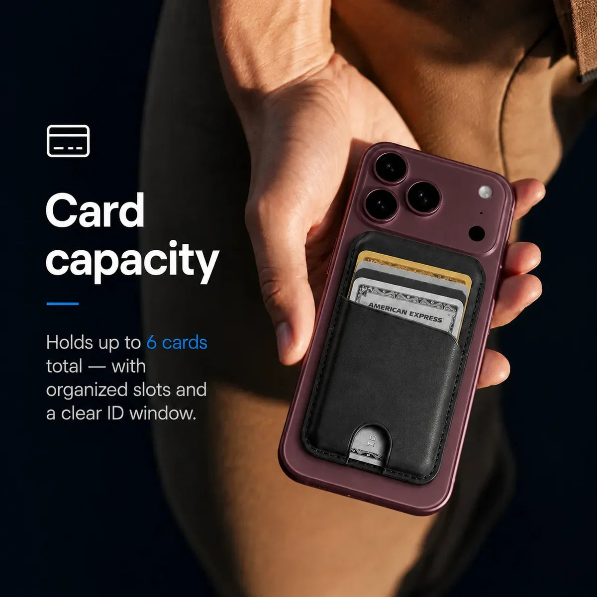 Midnight Black magnetic wallet attached to a Burgundy iPhone held in a hand. #color_Midnight Black