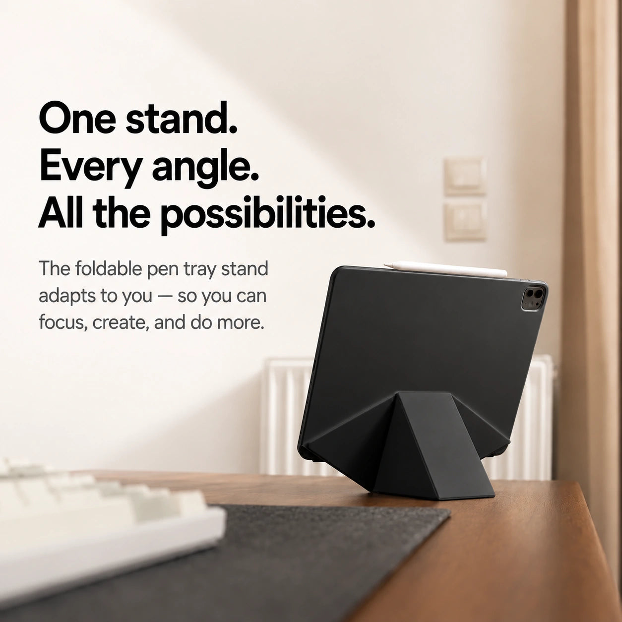 Midnight Black folding magnetic tablet stand on a raised desk support #color_Midnight Black