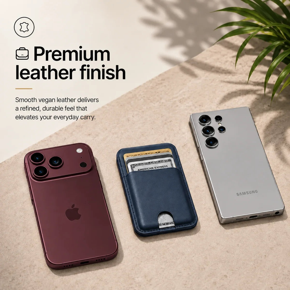 Navy Blue magnetic wallet and cards between a Burgundy iPhone and a silver Samsung phone. #color_Navy Blue