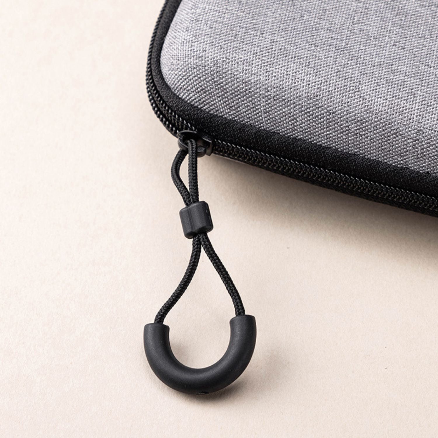 Close-up of the travel case zipper pull