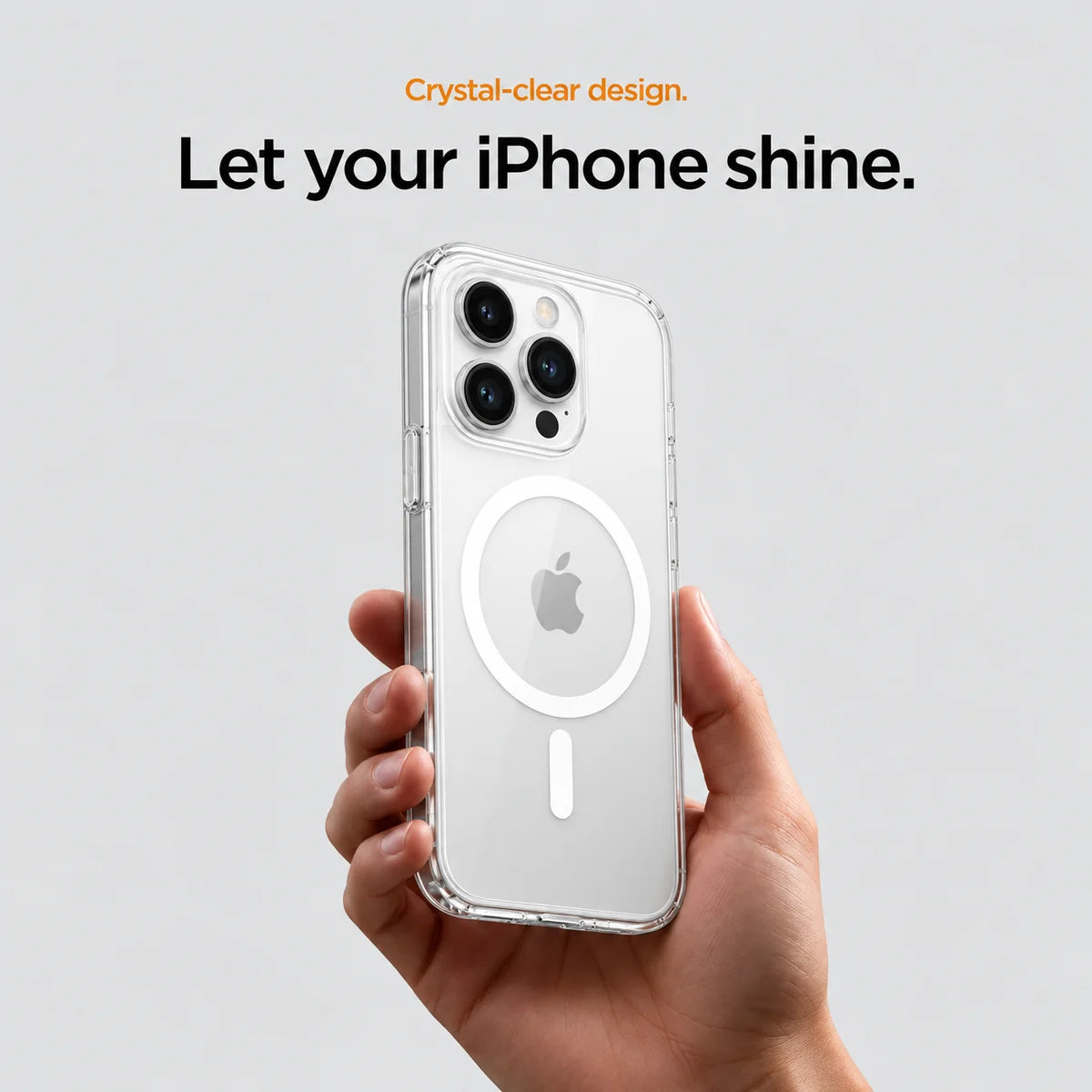 Clear magnetic phone case held at an angle, showing its transparent back and camera openings. #iPhone Model_iPhone 14 Pro