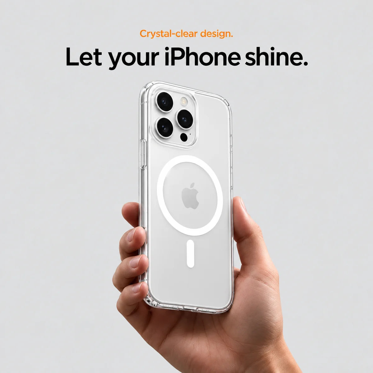 Clear magnetic phone case held at an angle, showing its transparent back and camera openings. #iPhone Model_iPhone 16 Pro Max