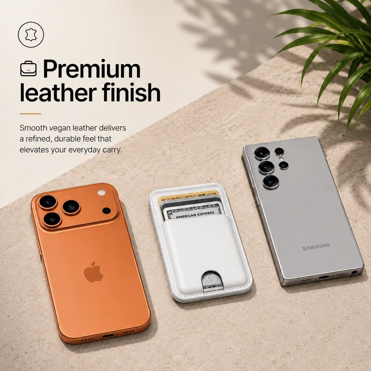 Arctic White magnetic wallet and cards between a Burgundy iPhone and a silver Samsung phone. #color_Arctic White