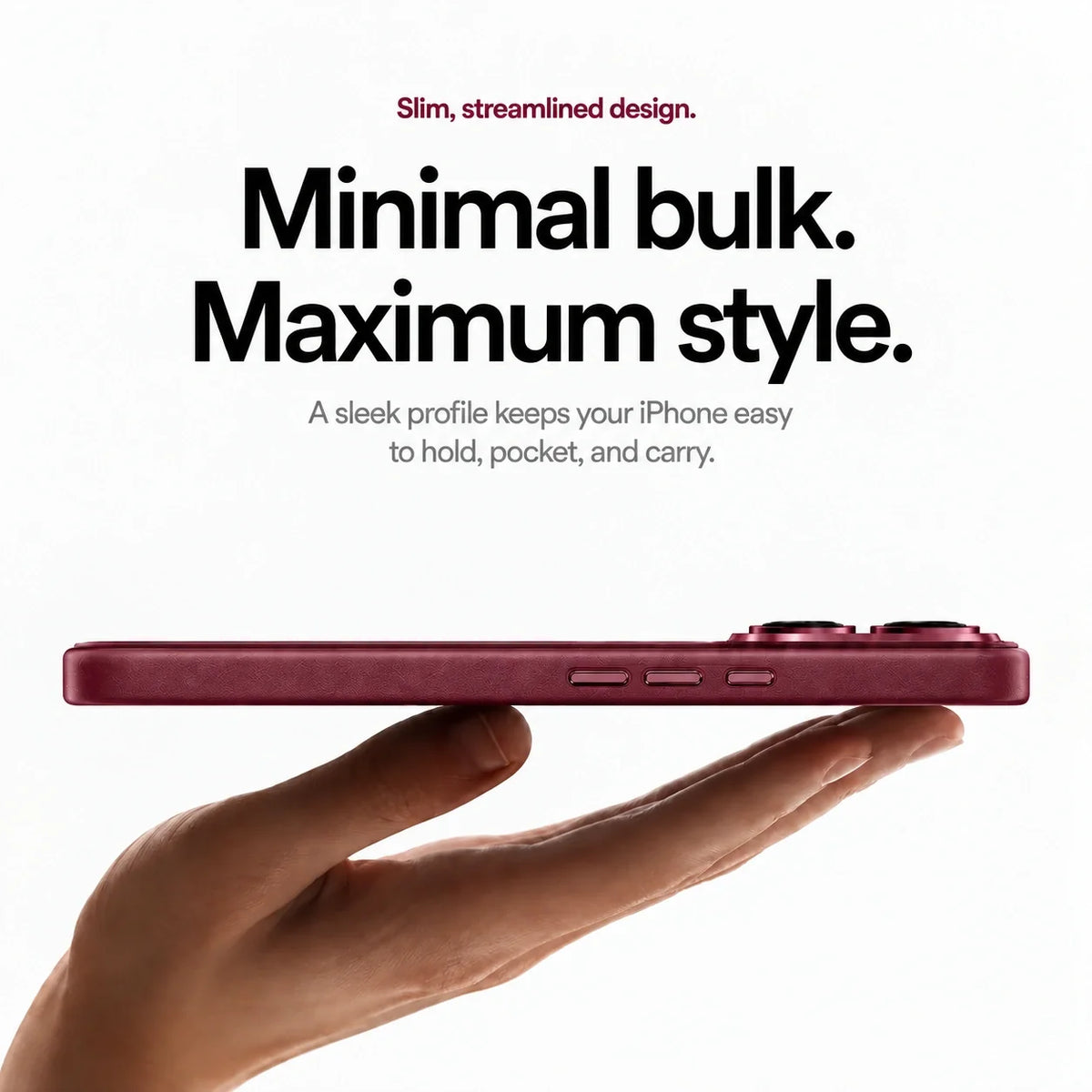 Burgundy leather-finish phone case resting on a hand in side profile #color_Burgundy
