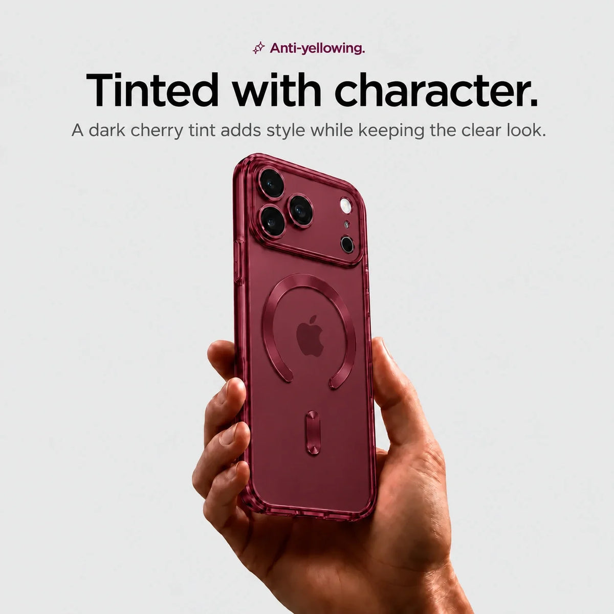 Burgundy clear magnetic phone case held upright in a hand #color_Burgundy