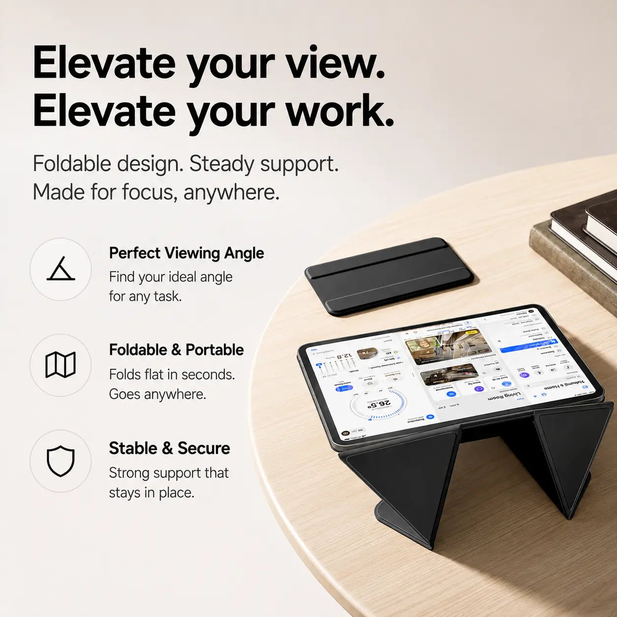 Midnight Black folding magnetic tablet stand used at a desk with detachable tray #color_Midnight Black