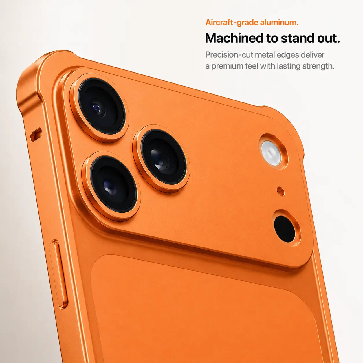 Orange aluminum bumper phone case in a close-up of its machined camera edge #color_Cosmic Orange
