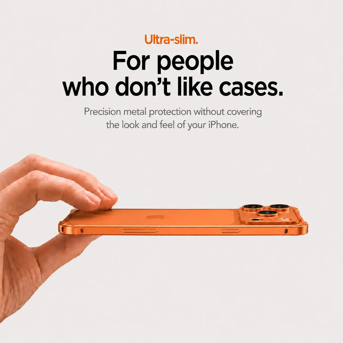 Orange aluminum bumper phone case held flat to show its slim side profile #color_Cosmic Orange