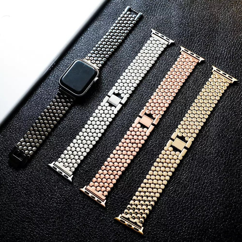 Elegant stainless steel Apple Watch band for women with a polished slim-link design, perfect for formal and casual wear.